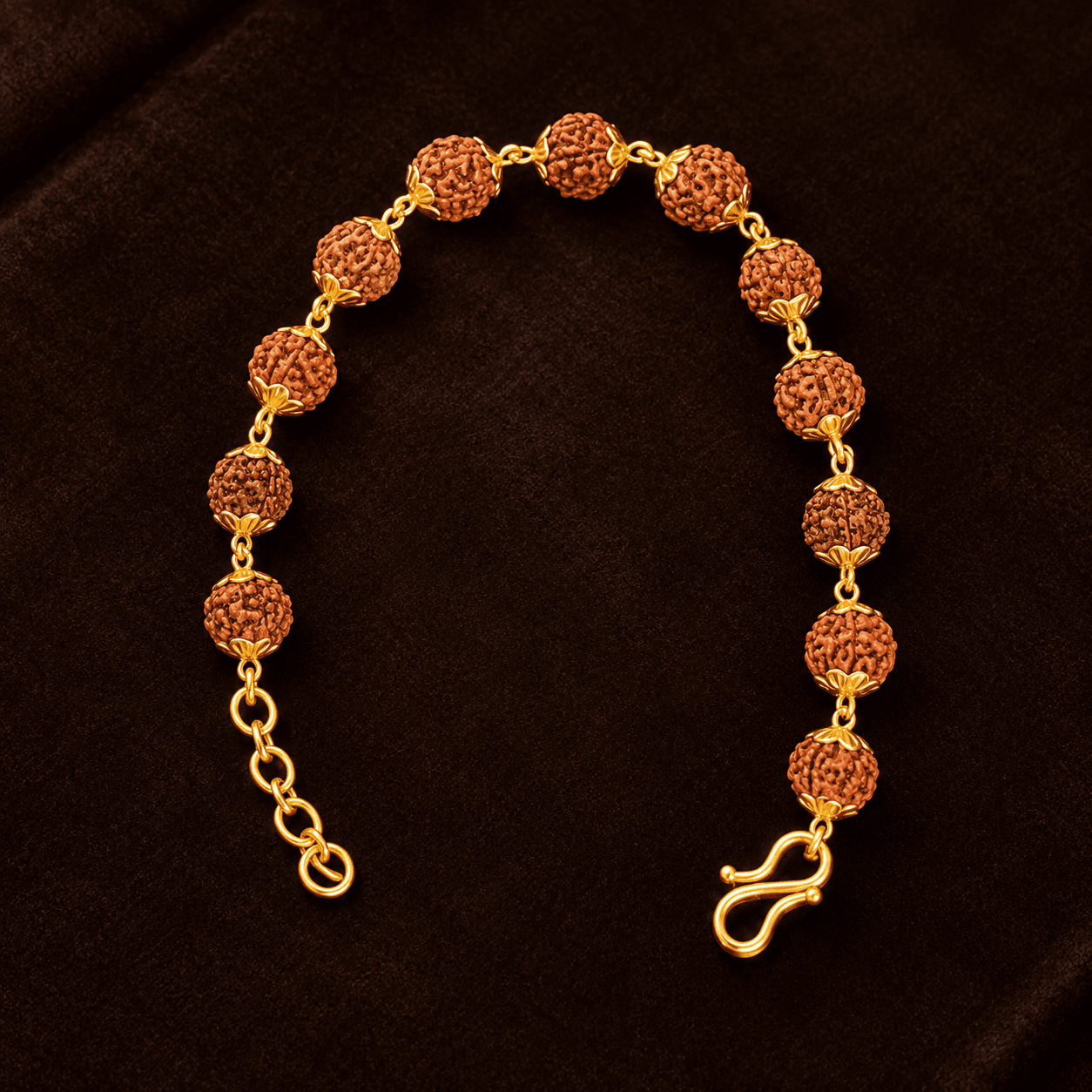 Bracelet with round brown textured beads and gold finish links