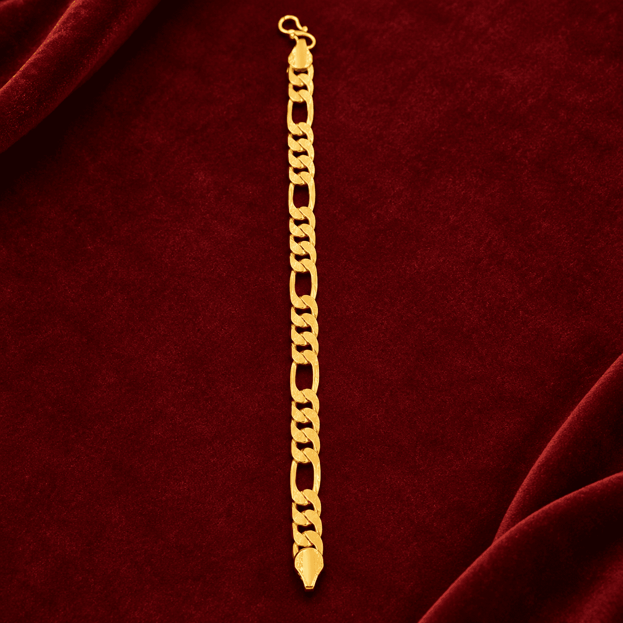 Gold-tone curb link bracelet with polished linked design